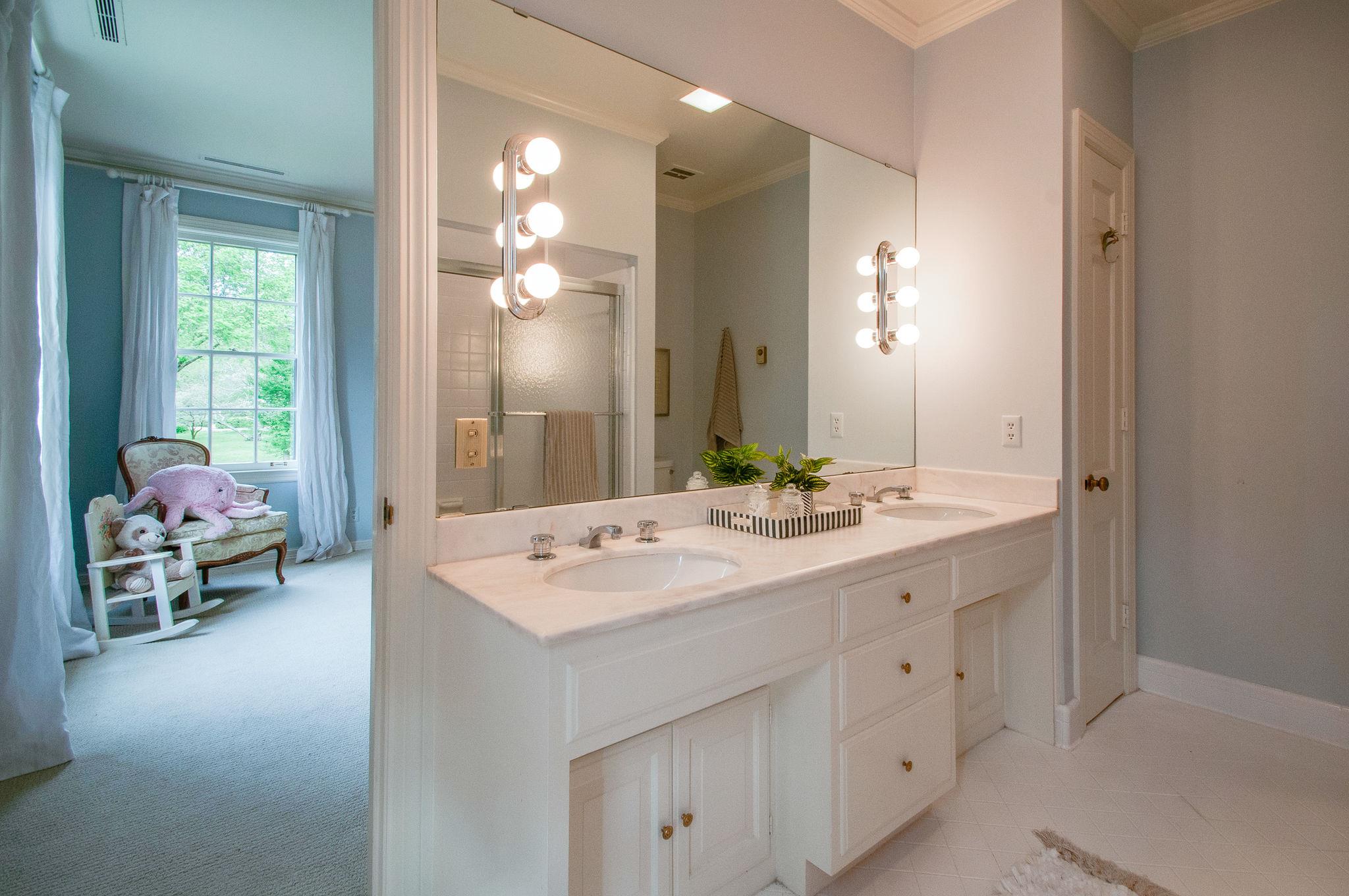 4737 Post Road Nashville, TN 37205 - Photo 19 of 30 a bathroom with a sink vanity and a mirror