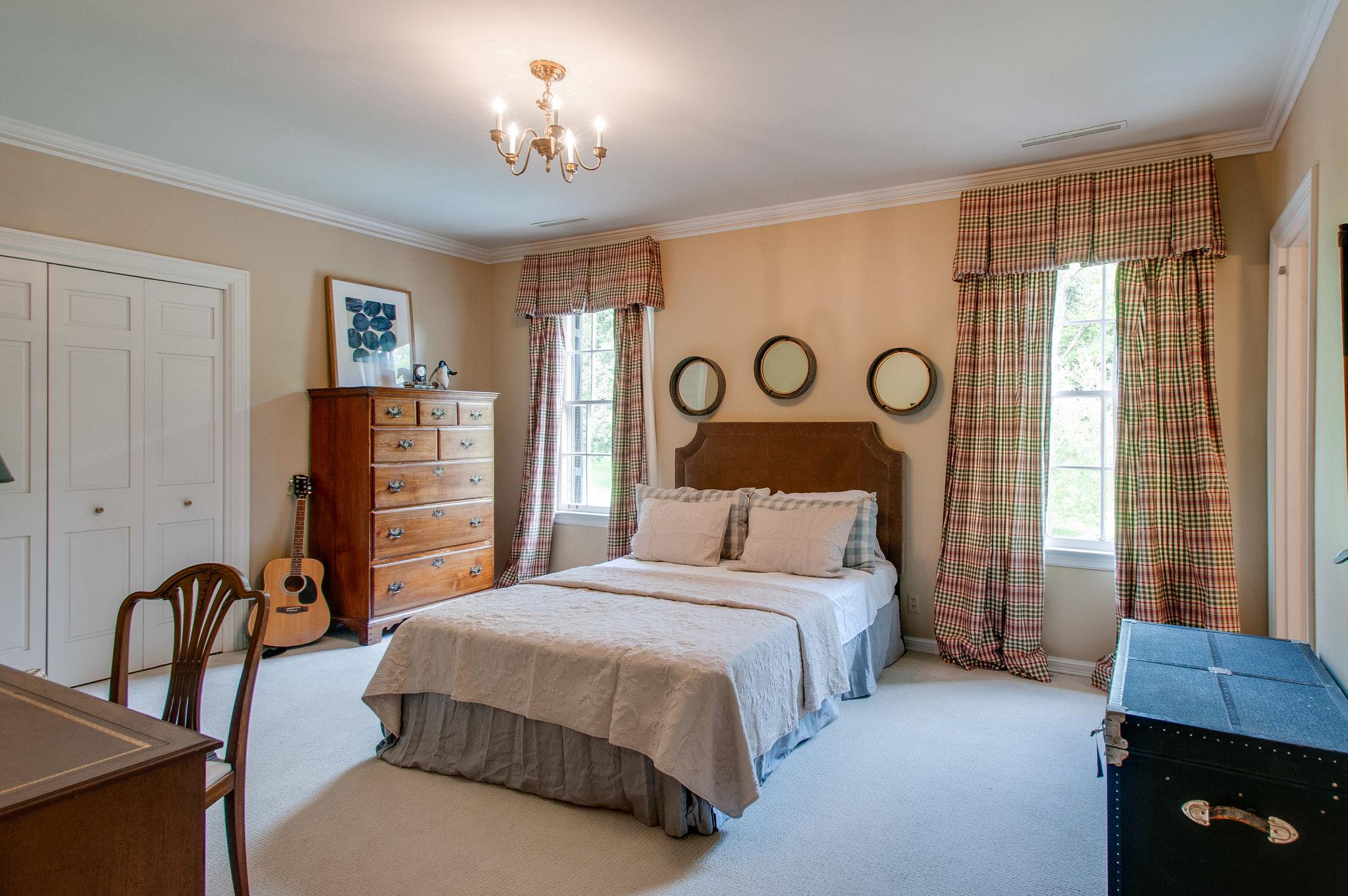 4737 Post Road Nashville, TN 37205 - Photo 21 of 30 a bedroom with a bed and a window