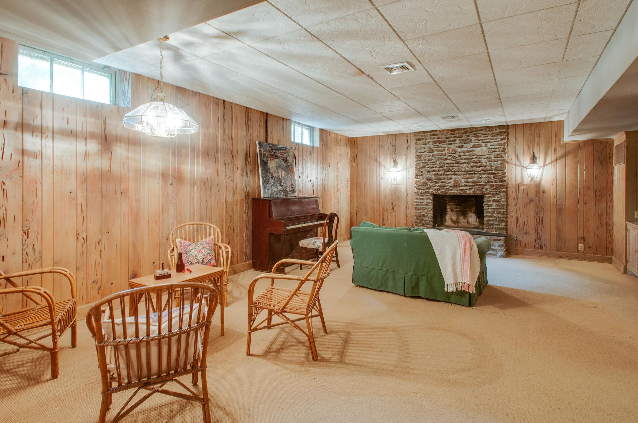 4737 Post Road Nashville, TN 37205 - Photo 25 of 30 a view of a livingroom with furniture and a fireplace