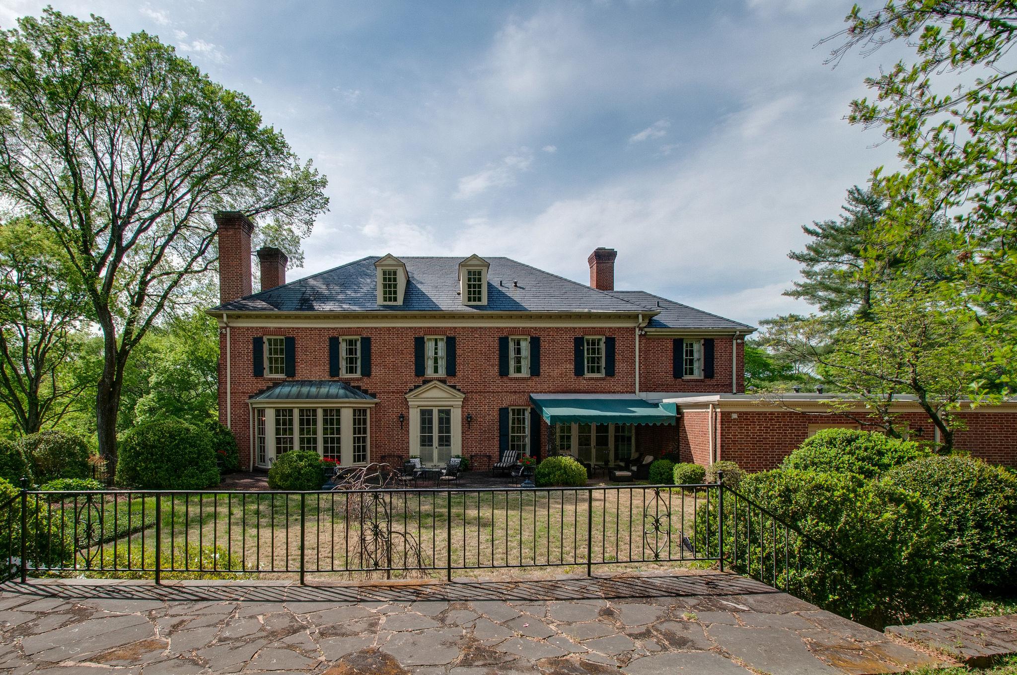 4737 Post Road Nashville, TN 37205 - Photo 27 of 30 a front view of a house with a yard