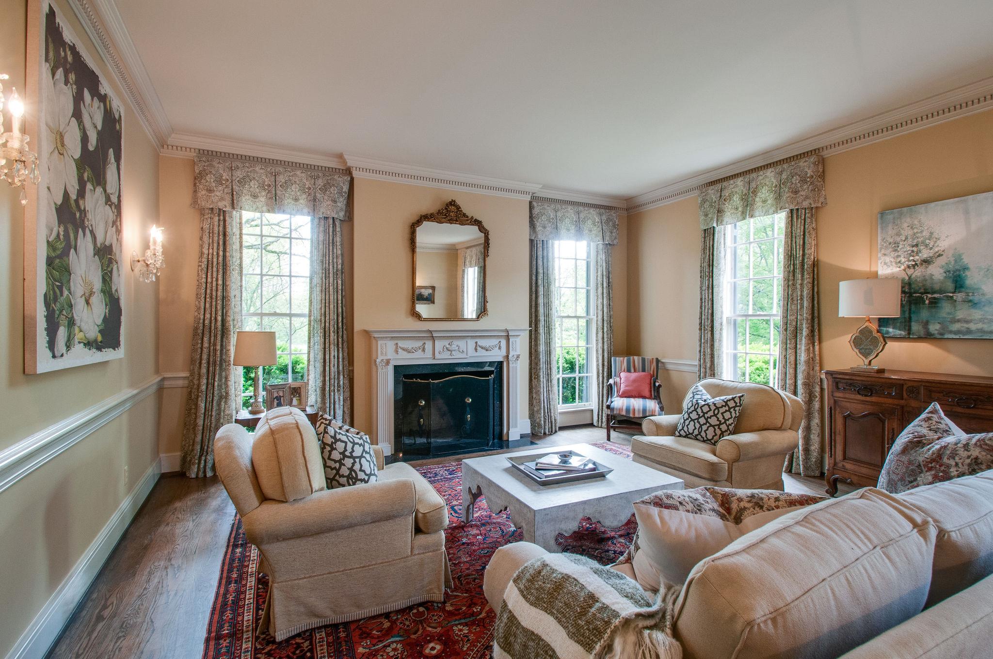 4737 Post Road Nashville, TN 37205 - Photo 9 of 30 a living room with furniture a fireplace and large windows