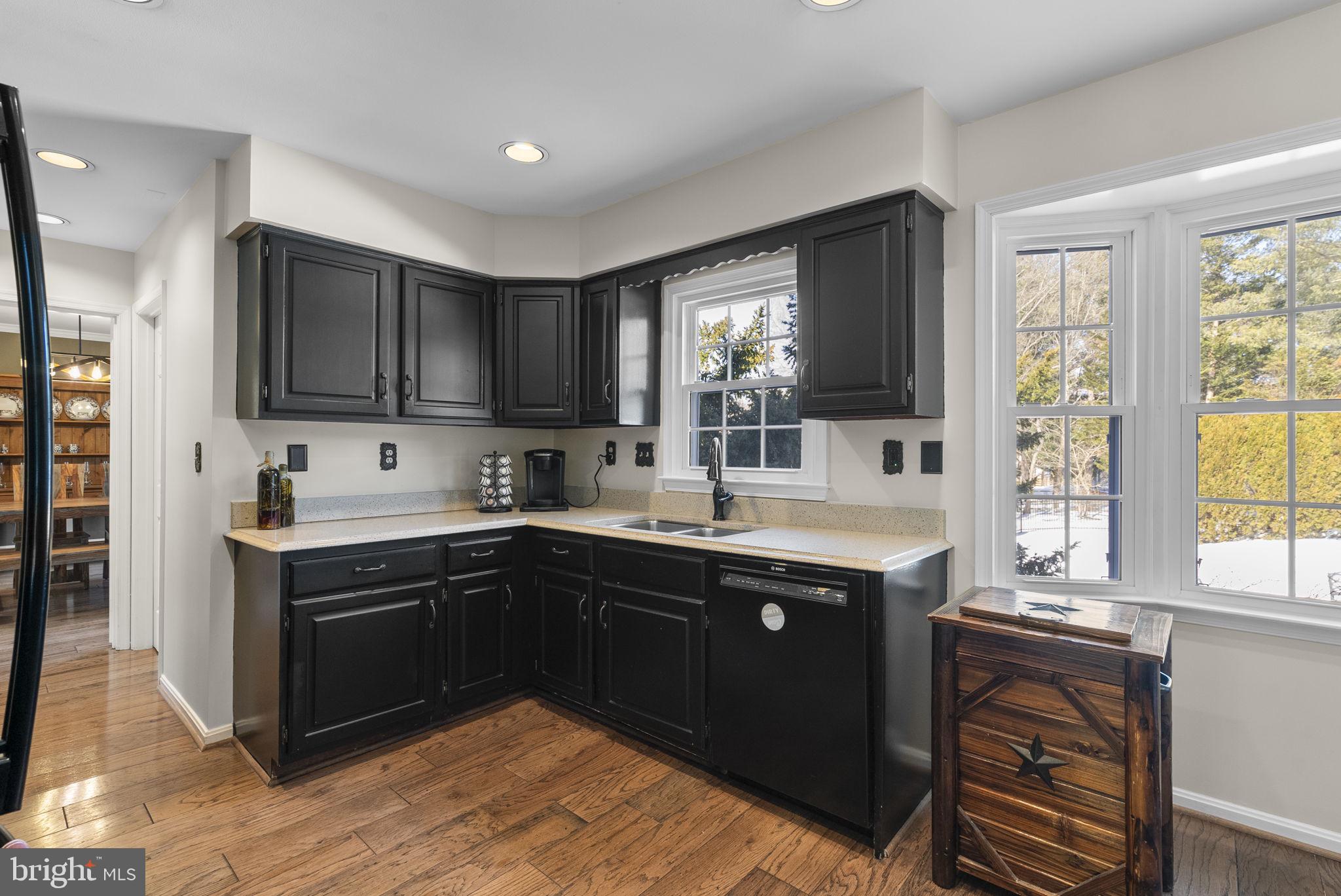 16424 Montecrest Lane Gaithersburg, MD 20878 - Photo 16 of 91 a kitchen with a sink window and cabinets