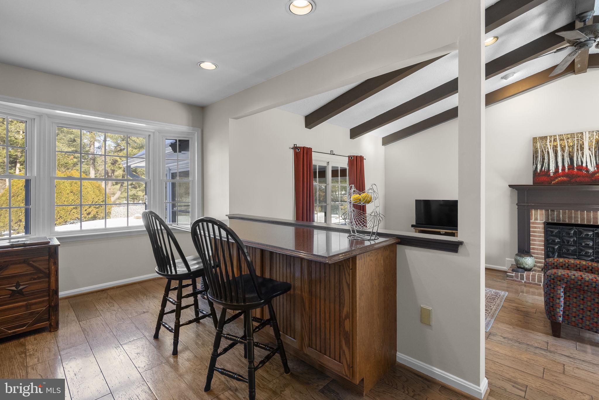 16424 Montecrest Lane Gaithersburg, MD 20878 - Photo 18 of 91 a view of a dining room with furniture window and wooden floor