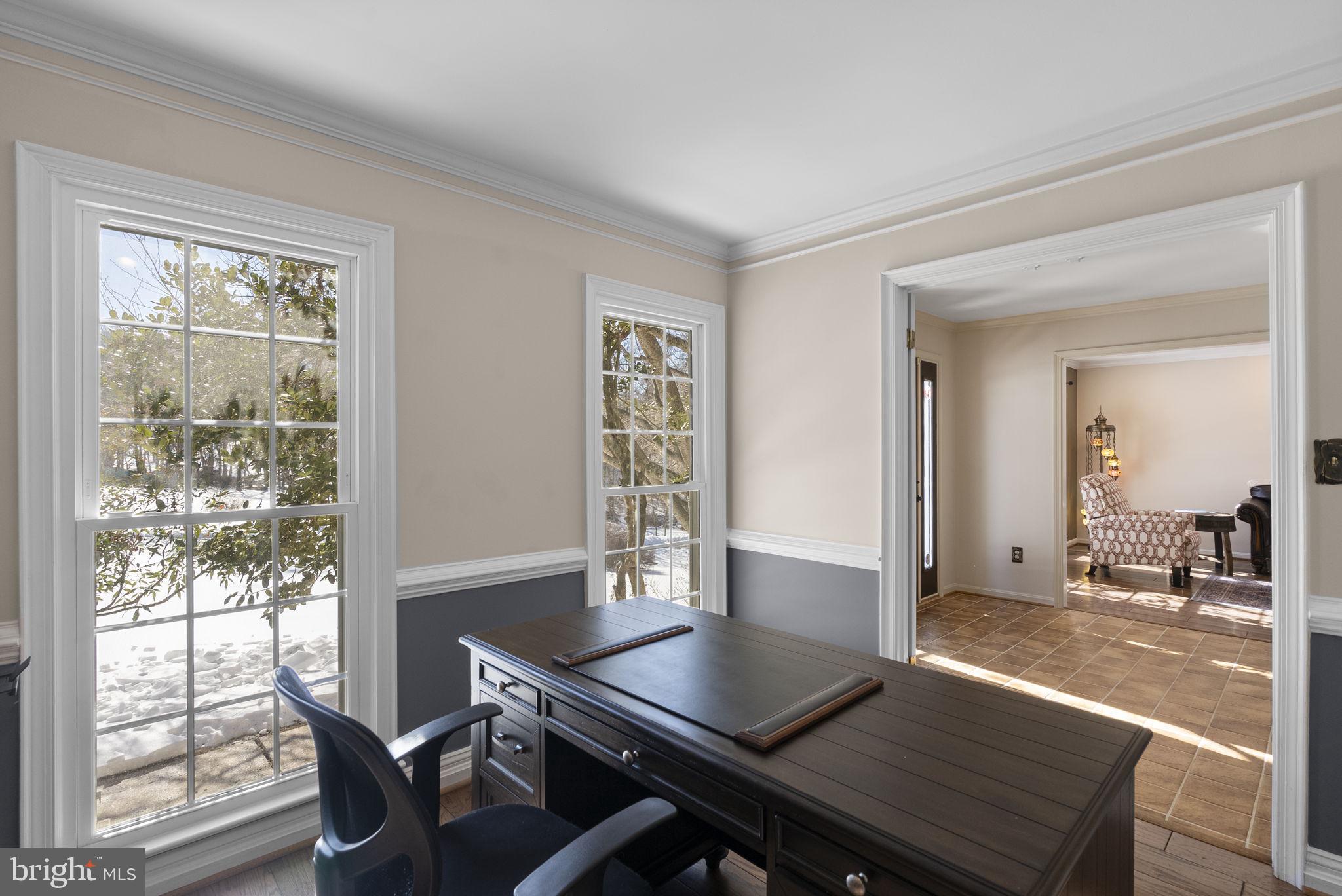 16424 Montecrest Lane Gaithersburg, MD 20878 - Photo 29 of 91 a view of a dining room with furniture and wooden floor