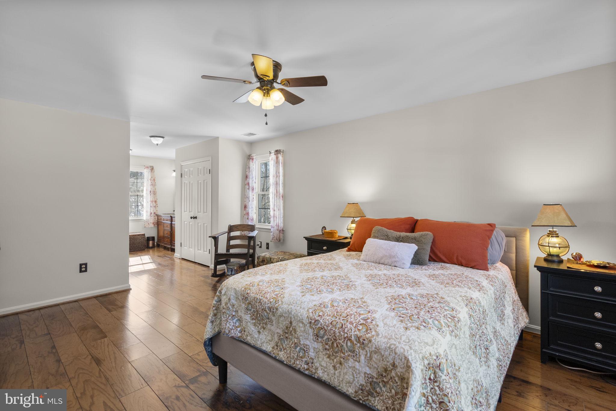 16424 Montecrest Lane Gaithersburg, MD 20878 - Photo 39 of 91 a bedroom with a bed and painting on the wall