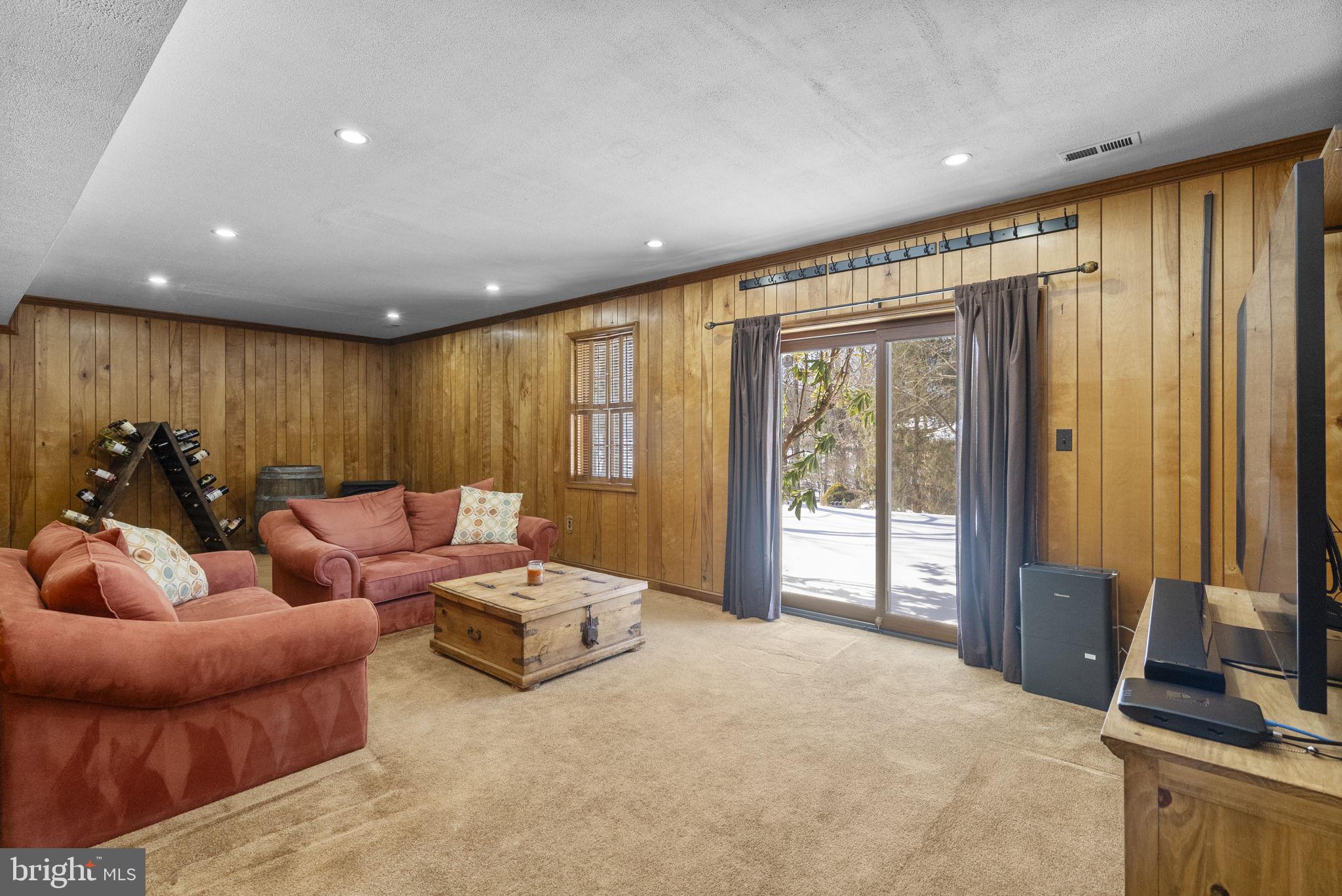 16424 Montecrest Lane Gaithersburg, MD 20878 - Photo 47 of 91 a living room with furniture and a flat screen tv