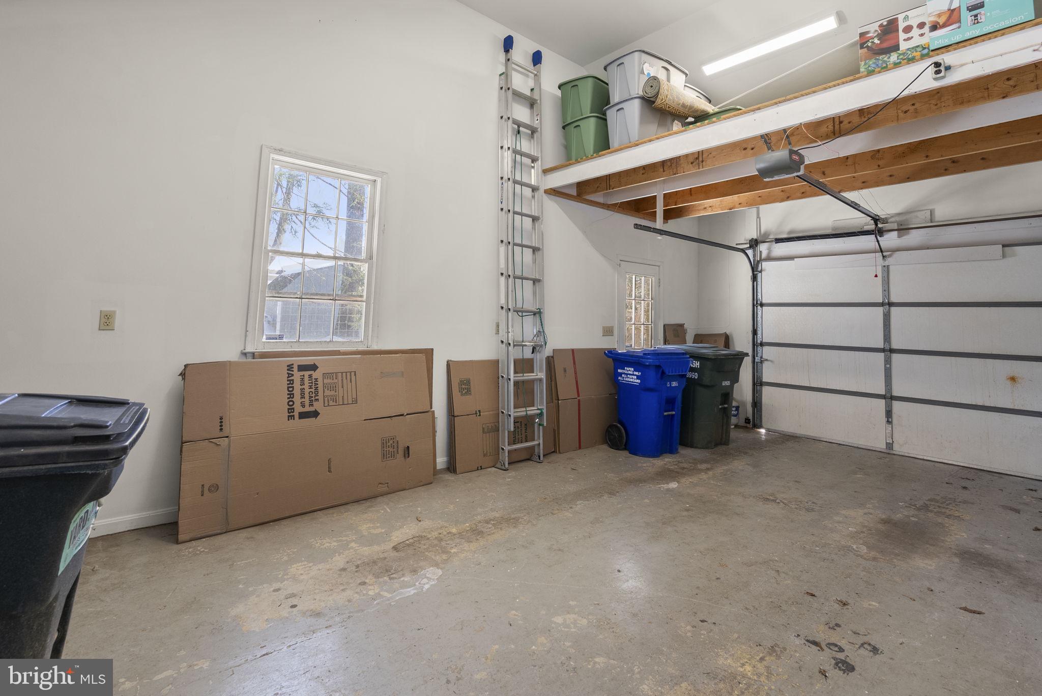 16424 Montecrest Lane Gaithersburg, MD 20878 - Photo 53 of 91 a view of a storage & utility room with racks on the wall