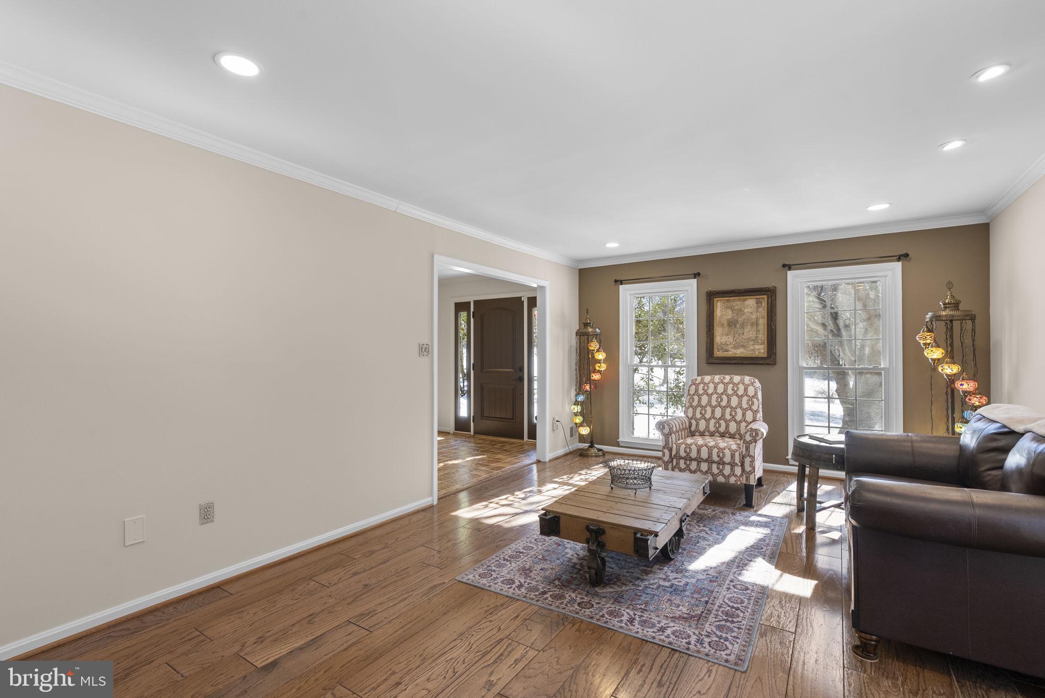 16424 Montecrest Lane Gaithersburg, MD 20878 - Photo 6 of 91 a living room with furniture and a large window
