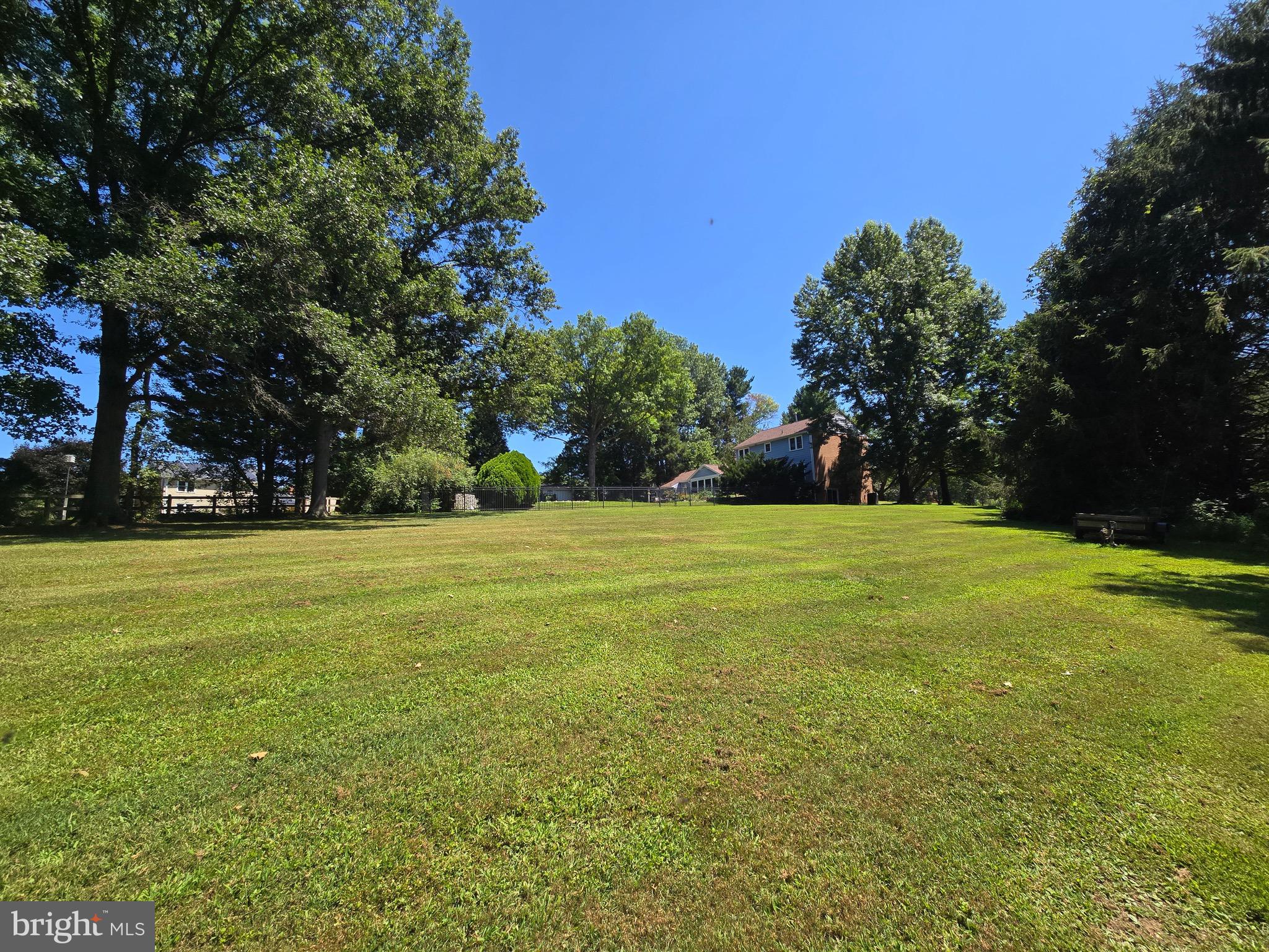 16424 Montecrest Lane Gaithersburg, MD 20878 - Photo 6 of 19 a view of swimming pool and trees in the background