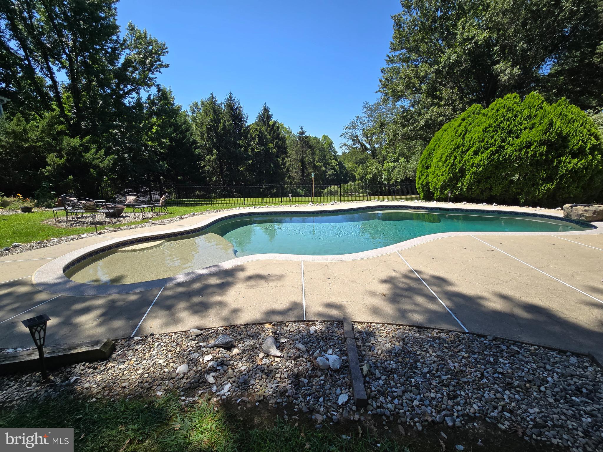 16424 Montecrest Lane Gaithersburg, MD 20878 - Photo 87 of 91 a view of a backyard with swimming pool