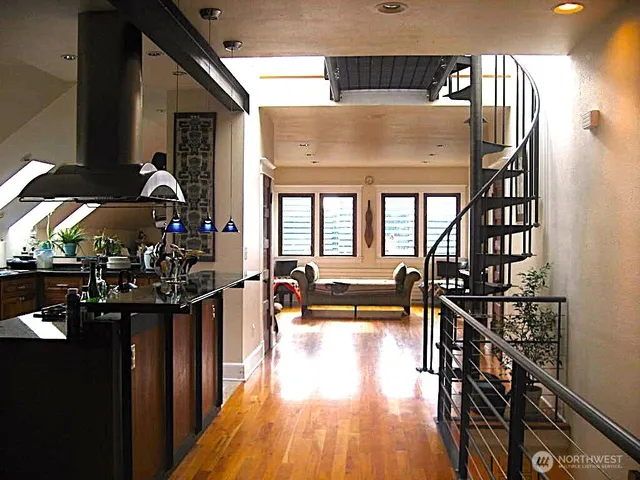 a view of a living room and dining room