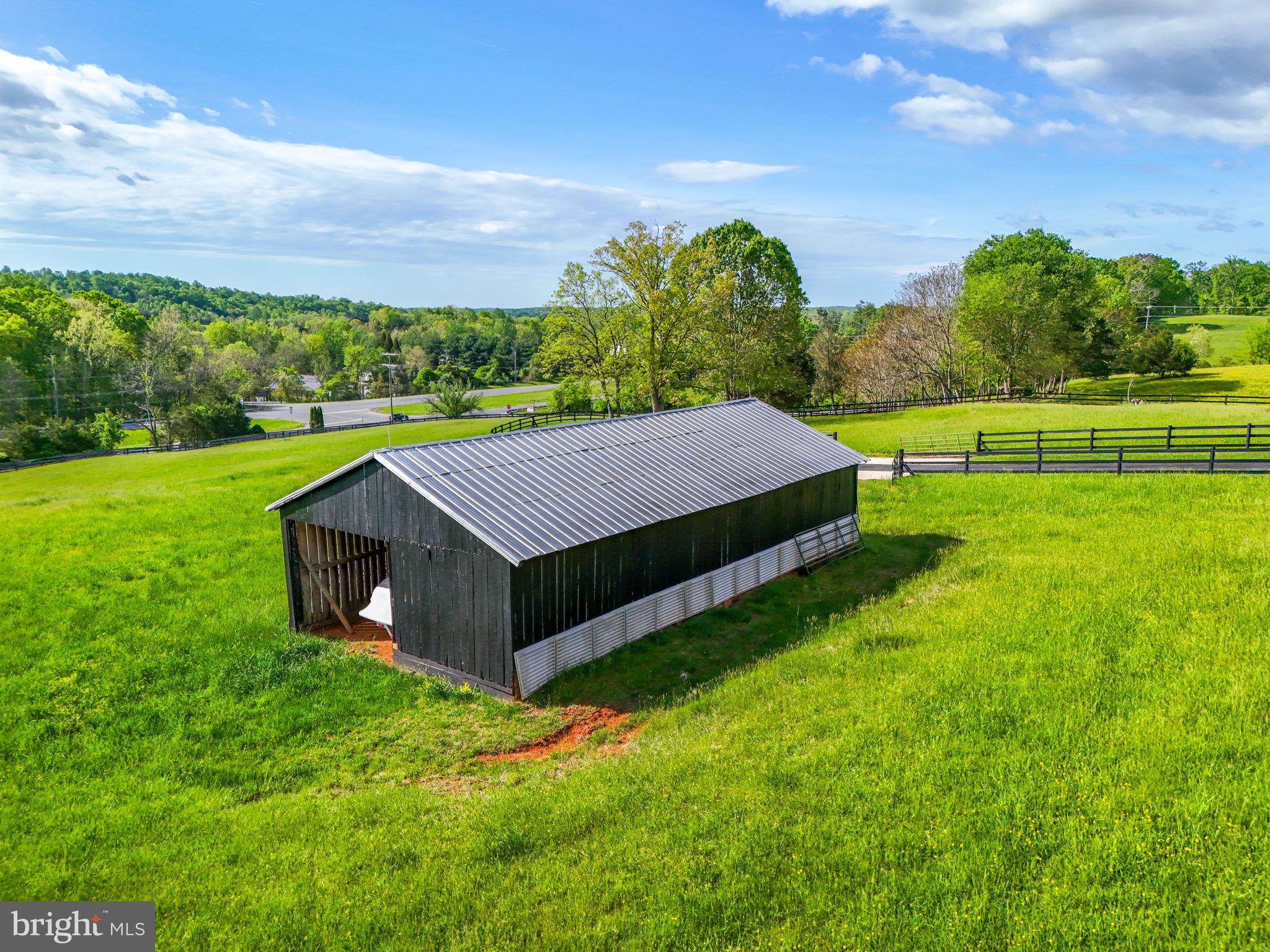 8511 Leeds Manor Road Warrenton, VA 20186 - Photo 11 of 36 a aerial view of a house with big yard