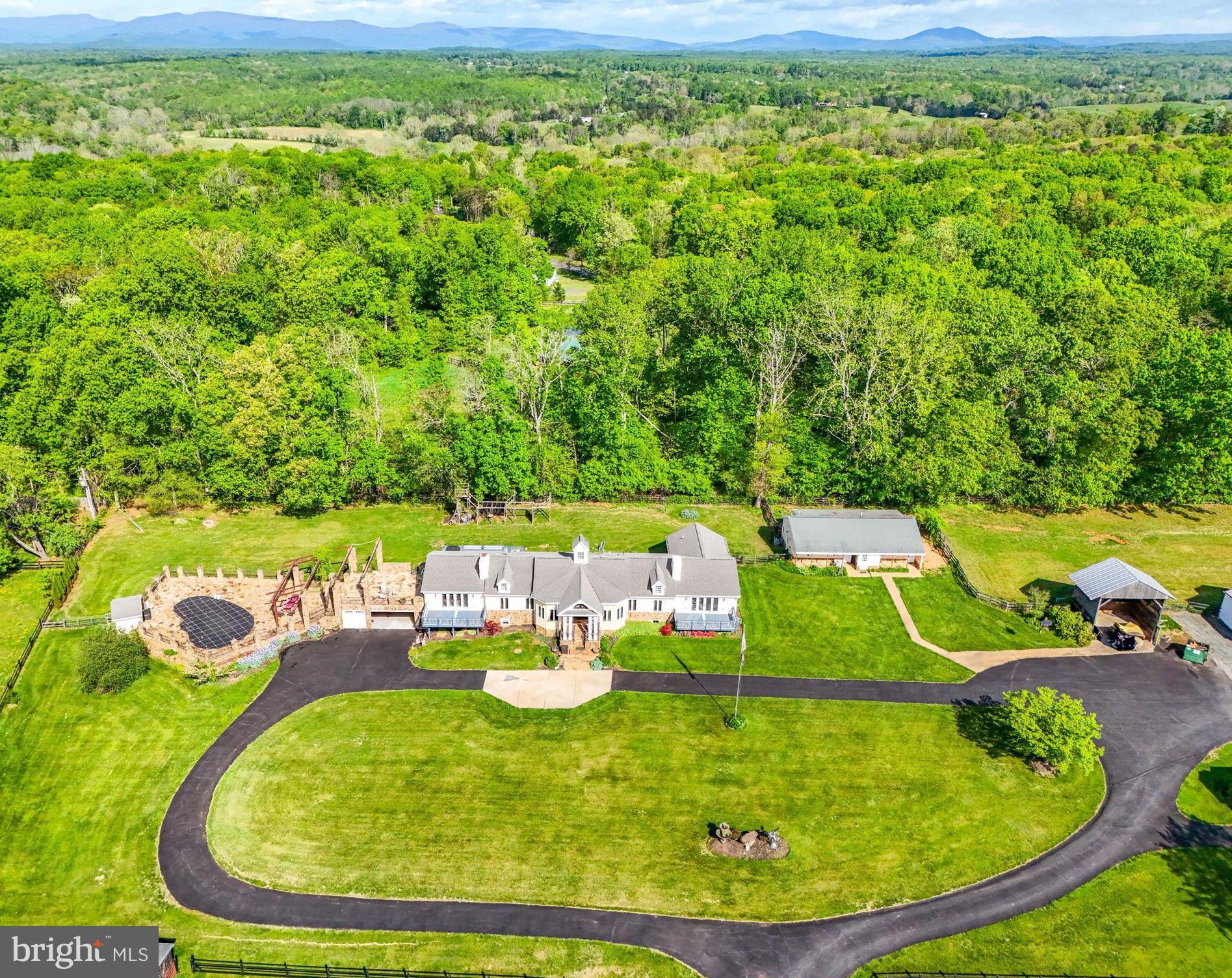 8511 Leeds Manor Road Warrenton, VA 20186 - Photo 14 of 36 a view of a swimming pool with a yard