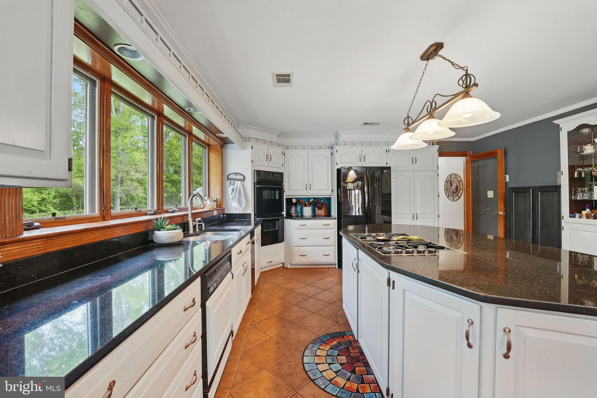 8511 Leeds Manor Road Warrenton, VA 20186 - Photo 18 of 36 a very nice looking kitchen with a large window