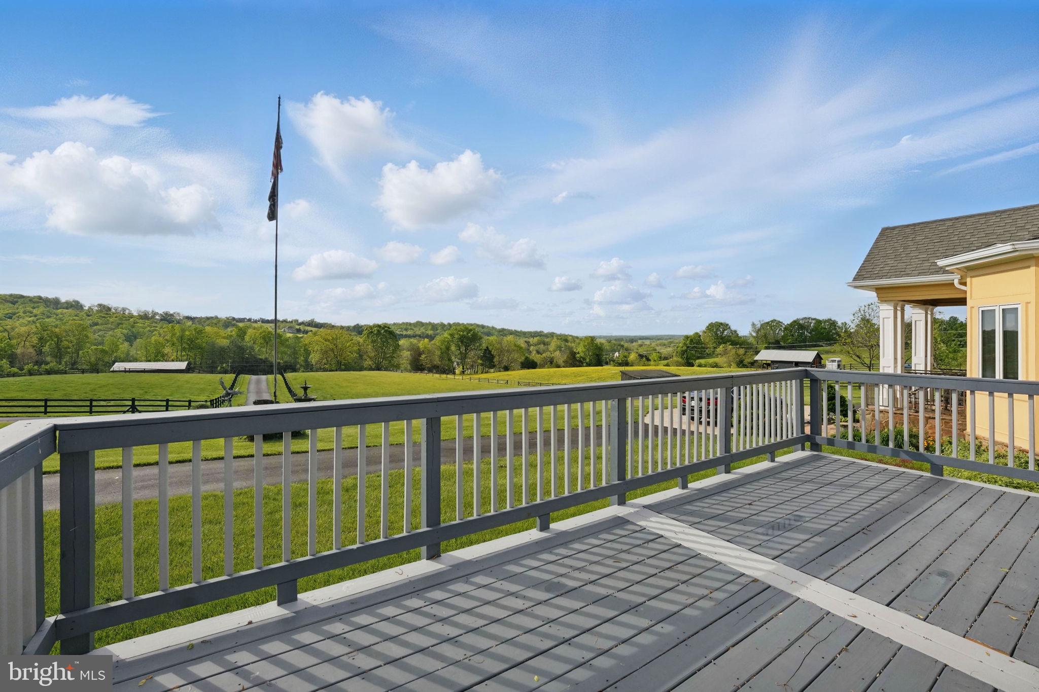 8511 Leeds Manor Road Warrenton, VA 20186 - Photo 29 of 36 a view of a balcony with wooden floor