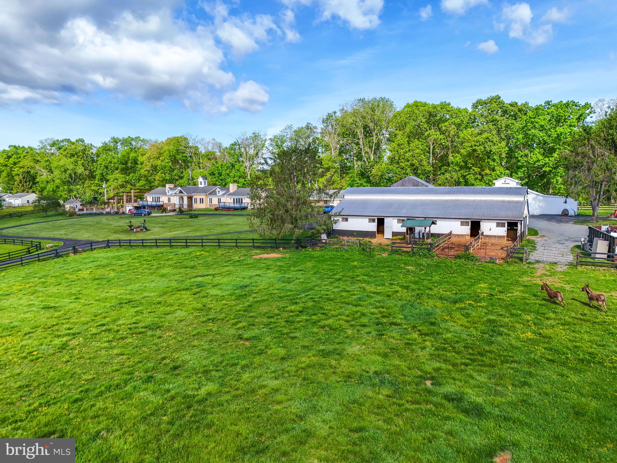 8511 Leeds Manor Road Warrenton, VA 20186 - Photo 30 of 36 a view of a house with a big yard
