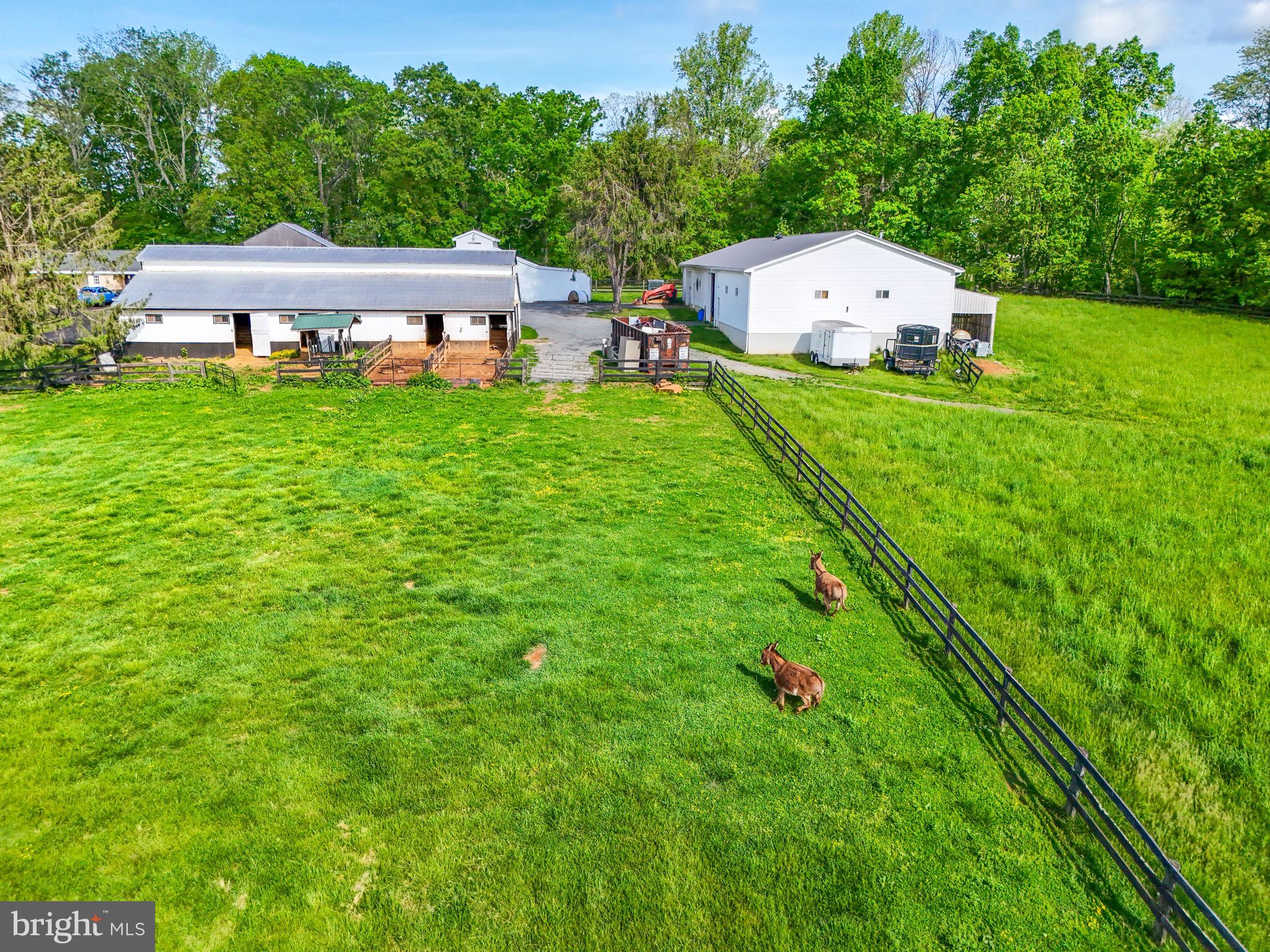 8511 Leeds Manor Road Warrenton, VA 20186 - Photo 36 of 36 a backyard of a house with table and chairs