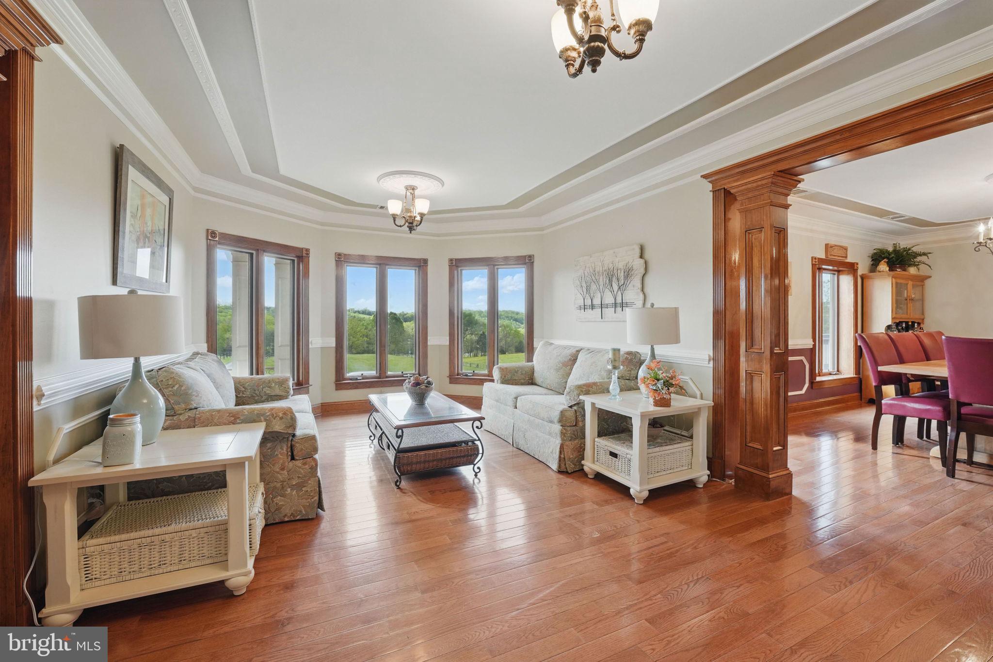 8511 Leeds Manor Road Warrenton, VA 20186 - Photo 4 of 36 a living room with furniture and a large window