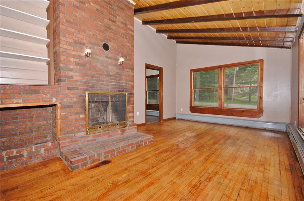 270 Rooks Road Holden, ME 04429 - Photo 12 of 27 Fireplace with flue for woodstove...
