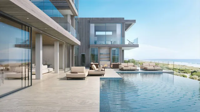 an outdoor living space with furniture and city view