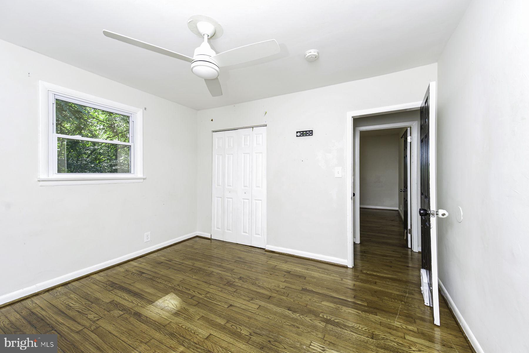 20121 Sparta Road Milford, VA 22514 - Photo 23 of 31 Bright and airy room with hardwood floors.