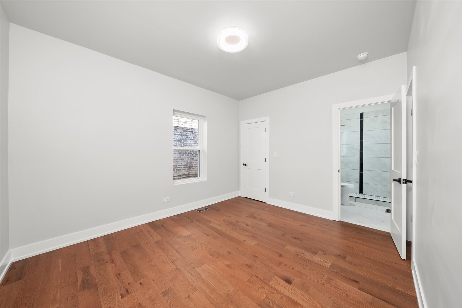 1631 North Parkside Avenue Chicago, IL 60639 - Photo 15 of 33 an empty room with windows