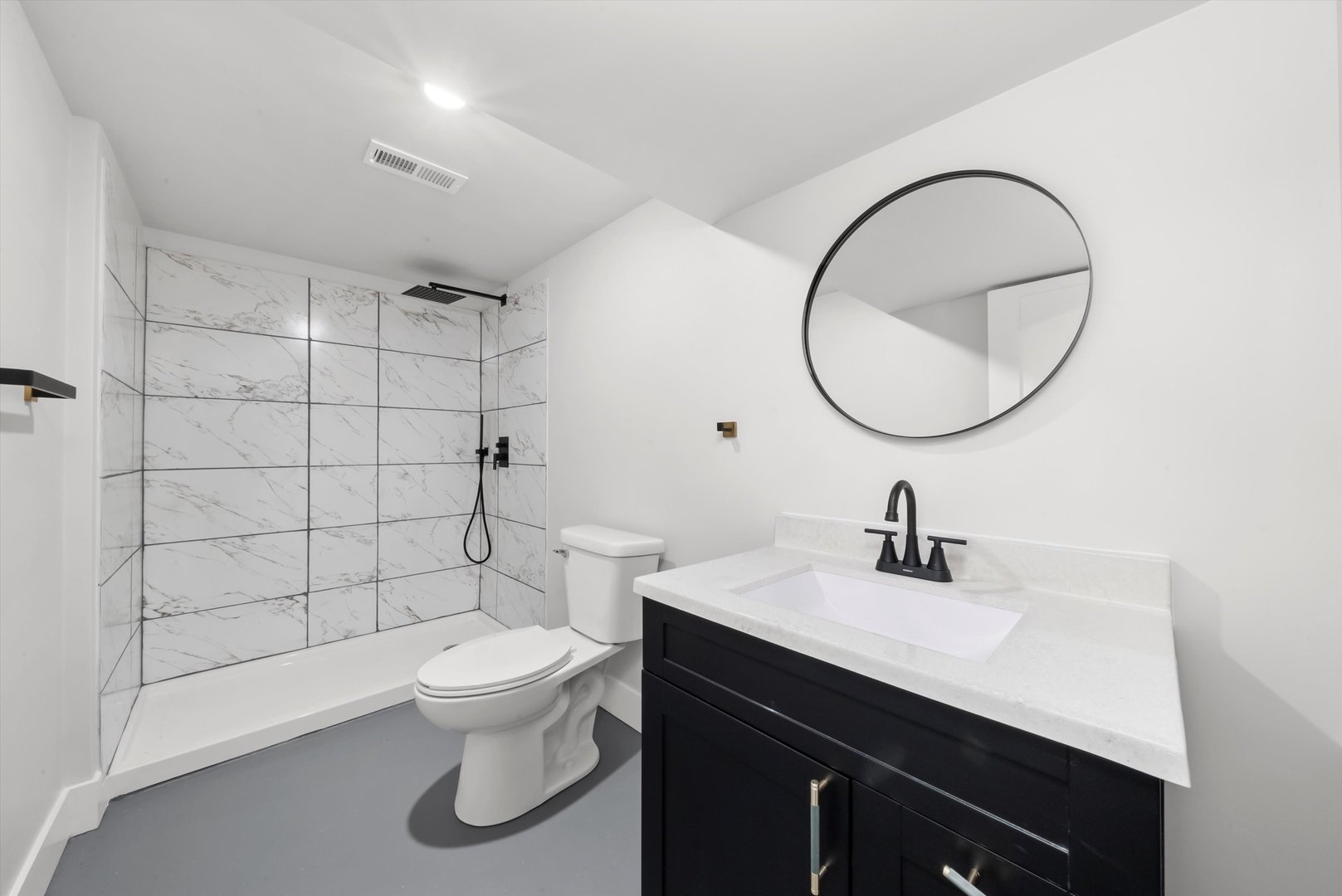 1631 North Parkside Avenue Chicago, IL 60639 - Photo 16 of 33 a bathroom with a sink a toilet and a mirror