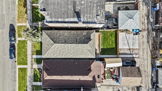 an aerial view of a building with garden