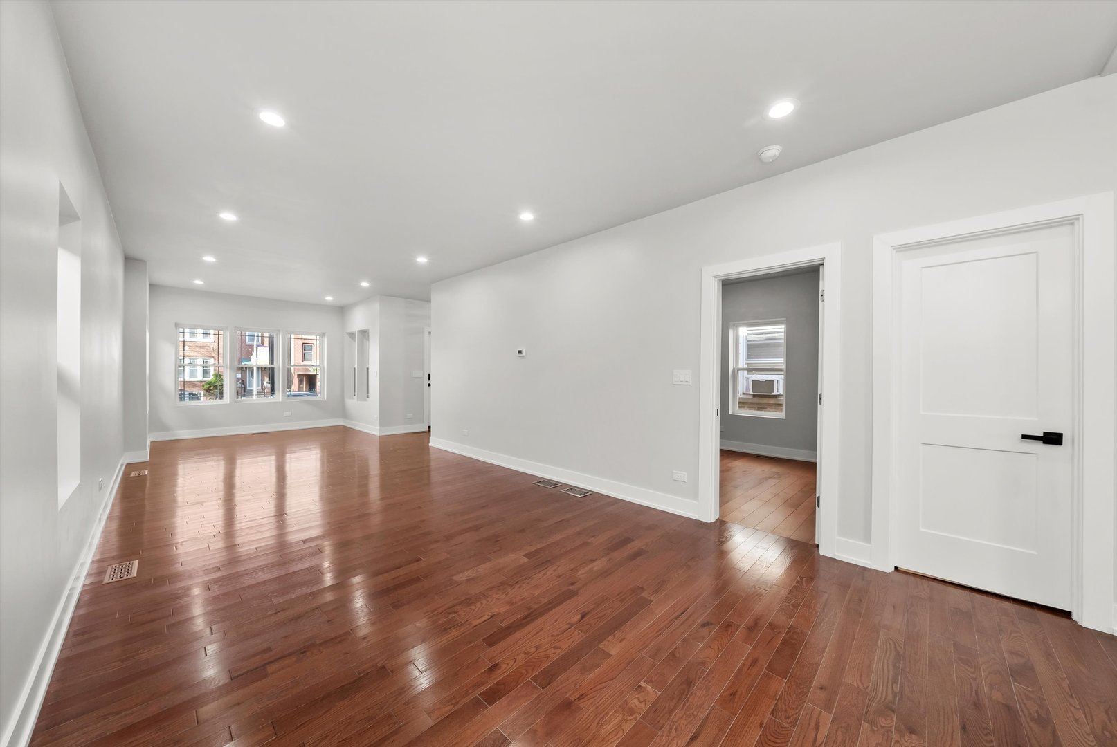 1631 North Parkside Avenue Chicago, IL 60639 - Photo 7 of 33 a view of empty room with wooden floor