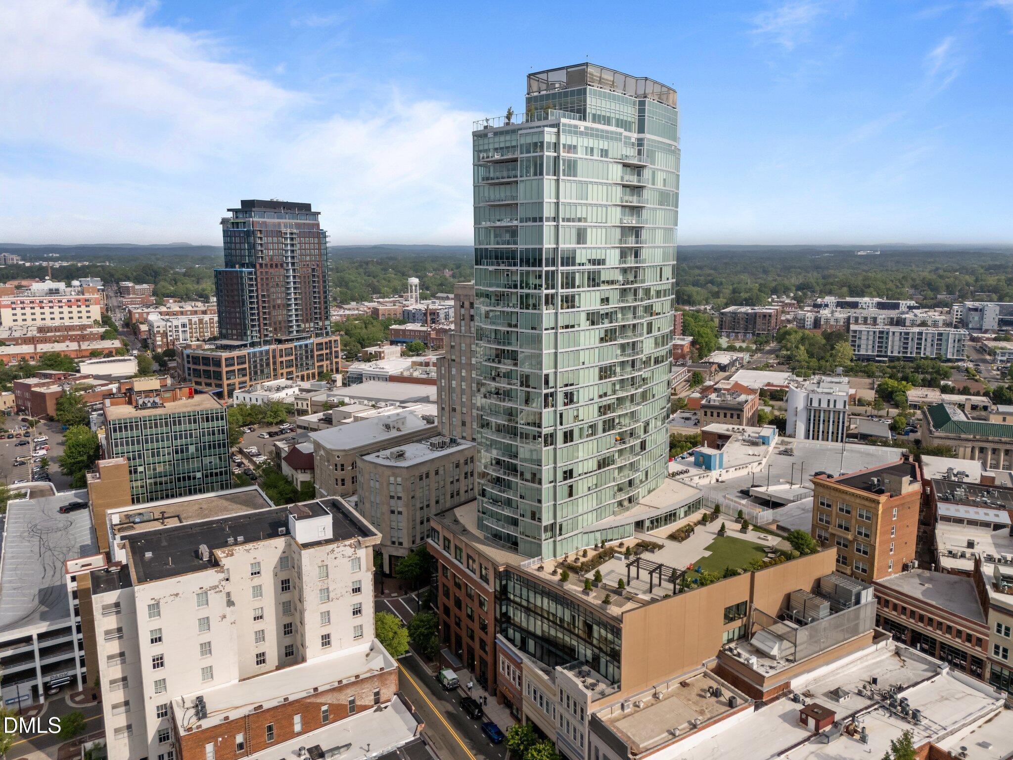 110 Corcoran Street, Unit 2101 Durham, NC 27701 - Photo 1 of 23 a city view with tall buildings