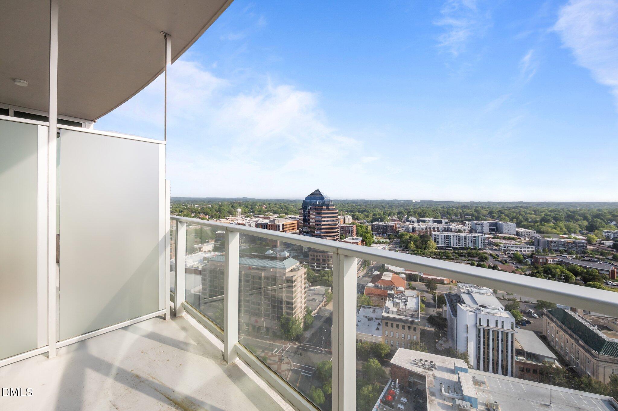 110 Corcoran Street, Unit 2101 Durham, NC 27701 - Photo 14 of 23 a view of a balcony with city