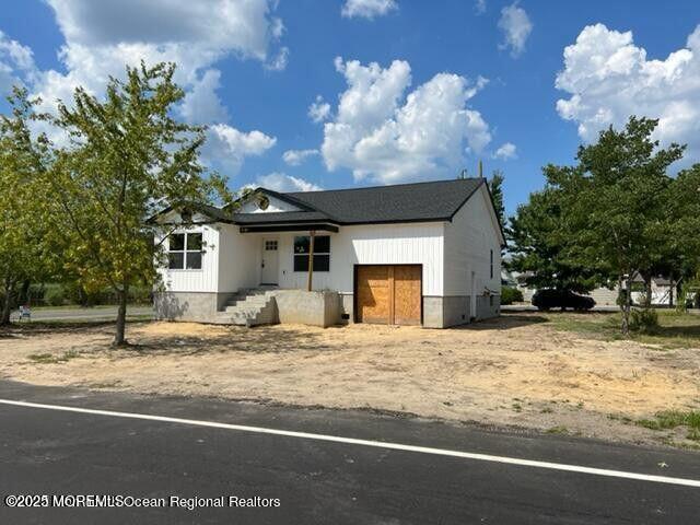553 Ocean Gate Drive Ocean Gate, NJ 08740 - Photo 9 of 25 a view of a house with a yard