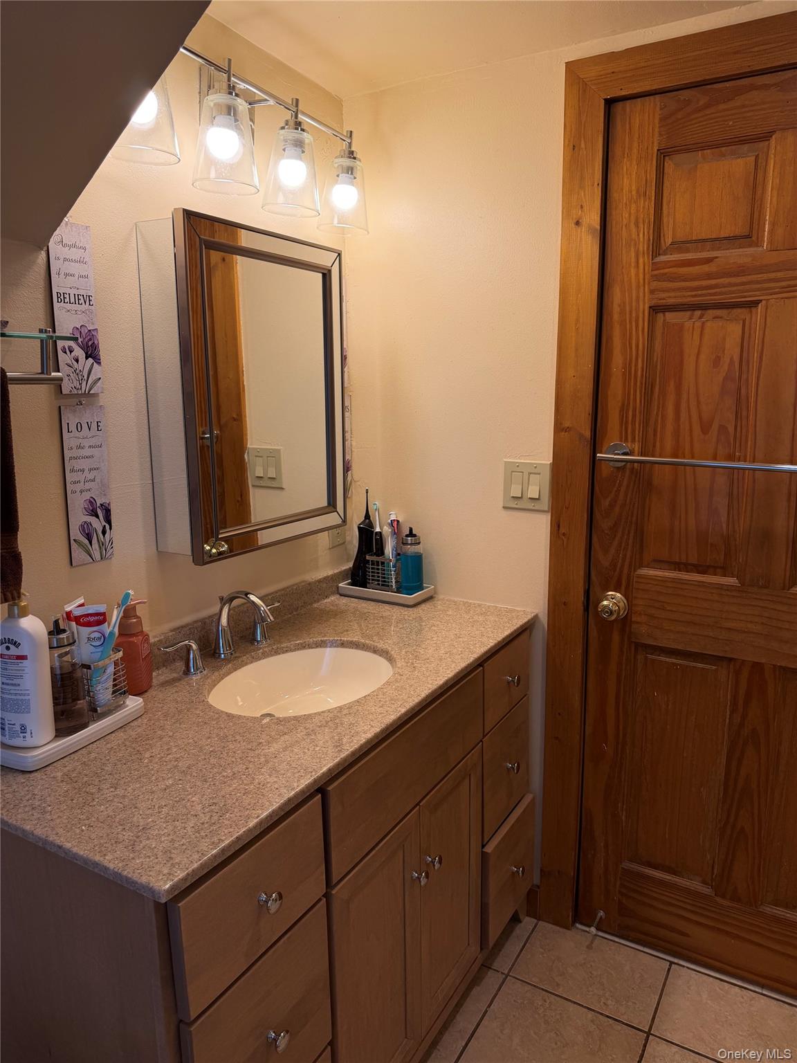 319 Blue Hill Road Hopewell Junction, NY 12533 - Photo 17 of 21 Second floor bathroom mirror and vanity.