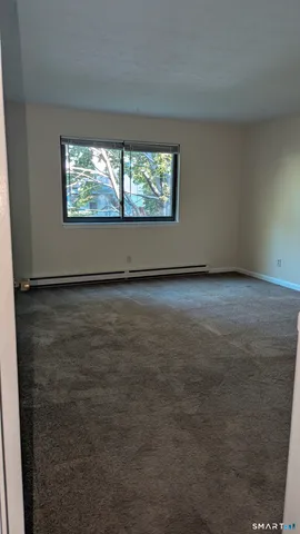 an empty room with window