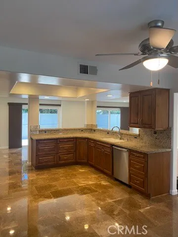 a large bathroom with a large tub and sink
