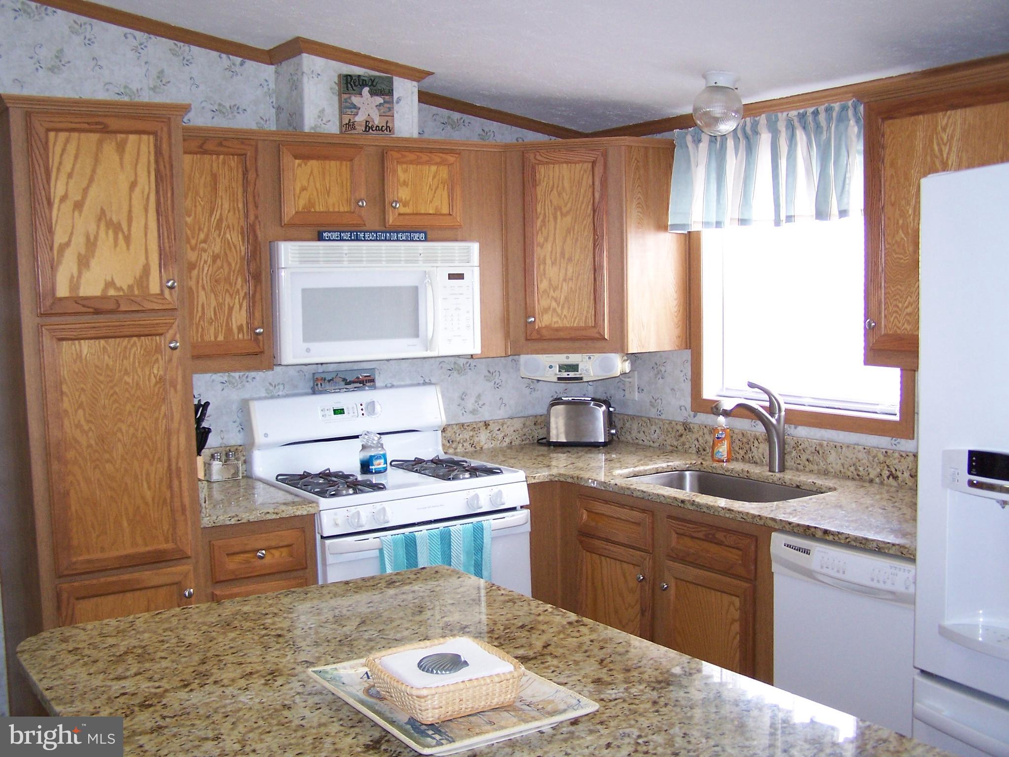 120 Clamshell Road Ocean City, MD 21842 - Photo 17 of 47 Kitchen Has Granite Counters
