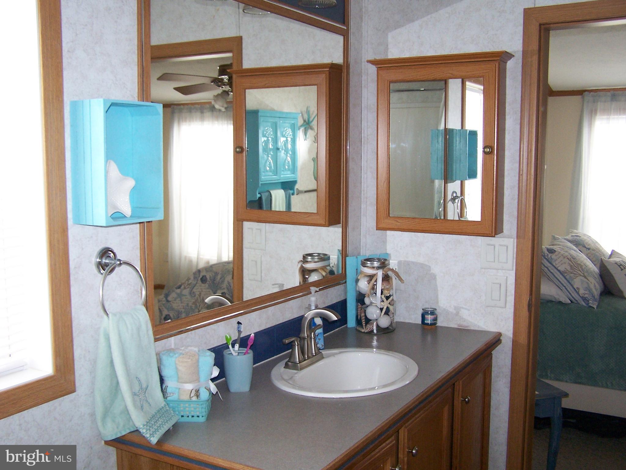 120 Clamshell Road Ocean City, MD 21842 - Photo 32 of 47 Master Bath Vanity