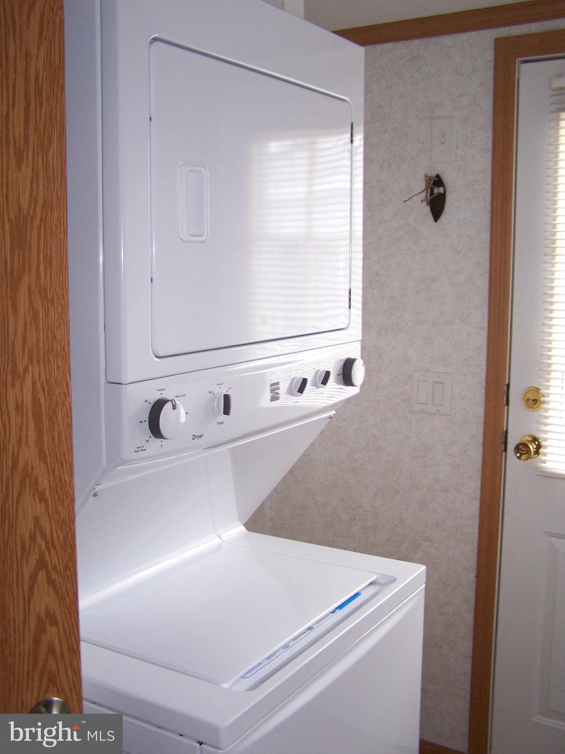 120 Clamshell Road Ocean City, MD 21842 - Photo 35 of 47 Stack Washer/Dryer in Laundry Room