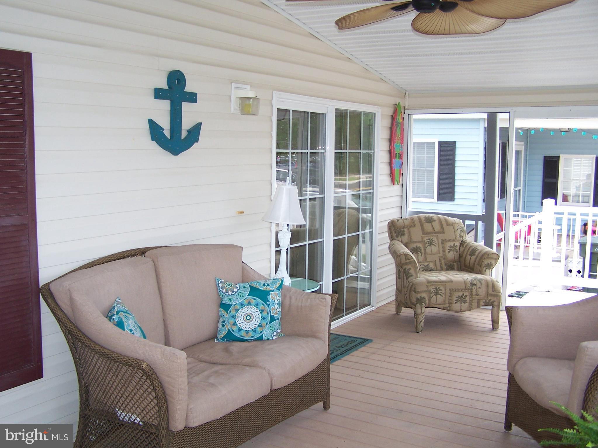120 Clamshell Road Ocean City, MD 21842 - Photo 9 of 47 Sliding Door Leading Into The Home