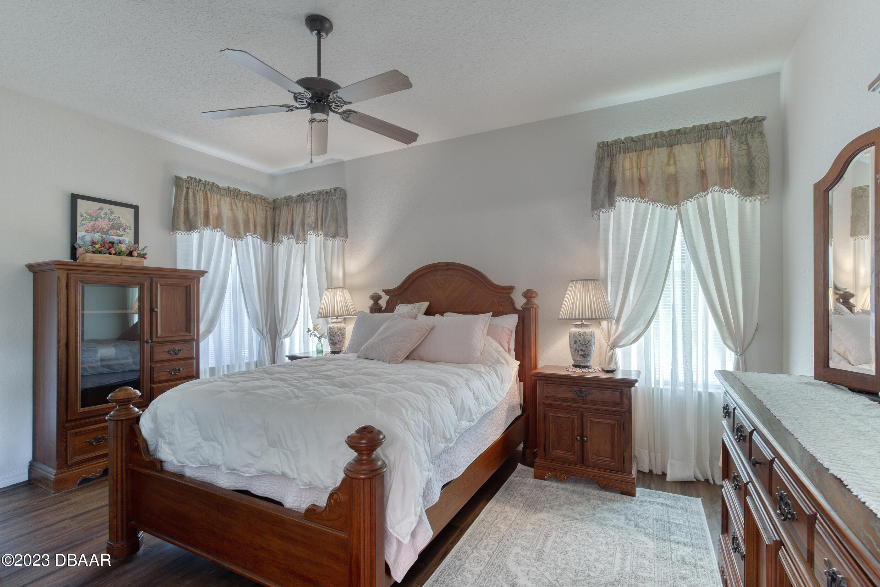 87 Timucuan Drive Ormond Beach, FL 32174 - Photo 22 of 63 a bedroom with a bed and a window