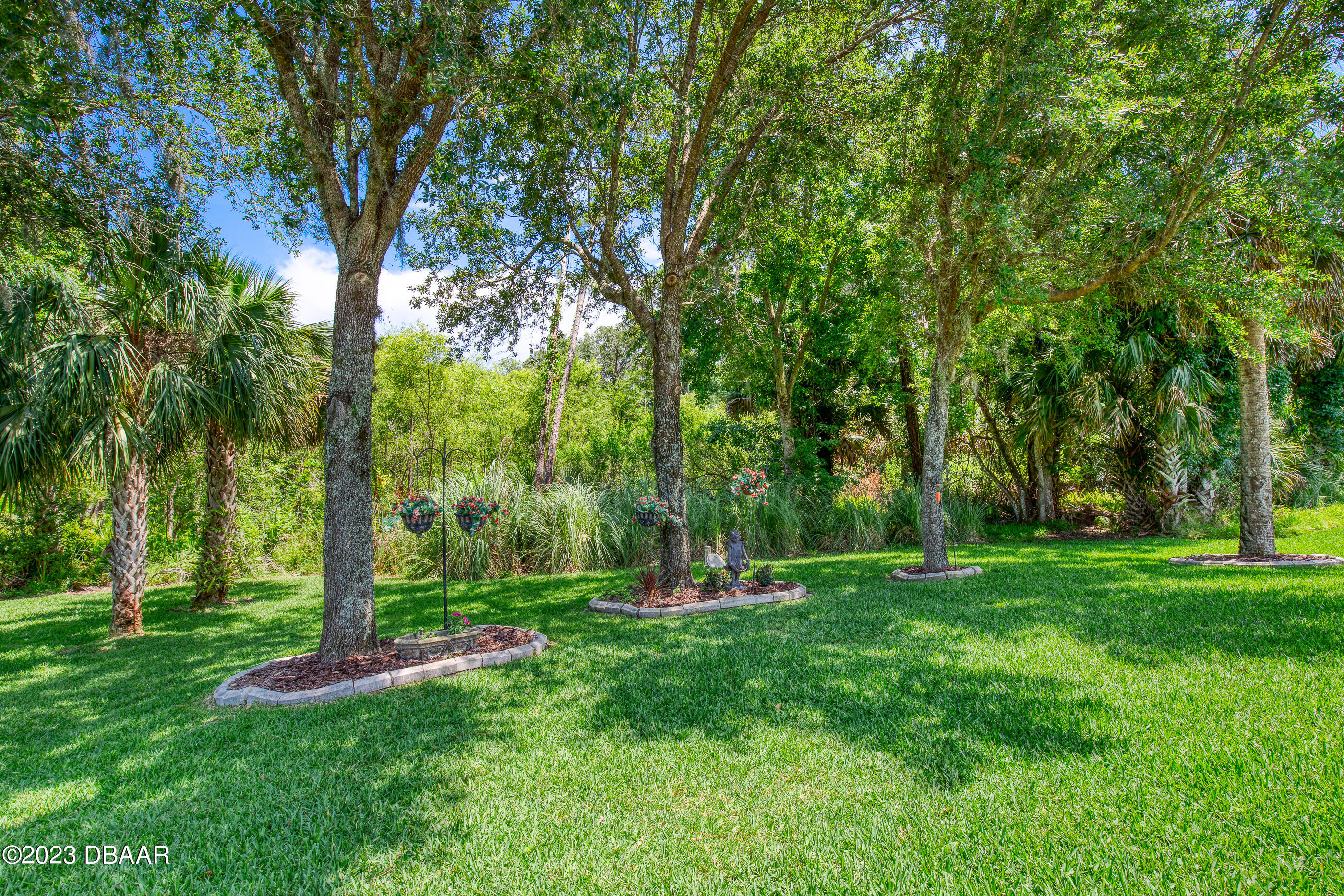 87 Timucuan Drive Ormond Beach, FL 32174 - Photo 43 of 63 a garden view