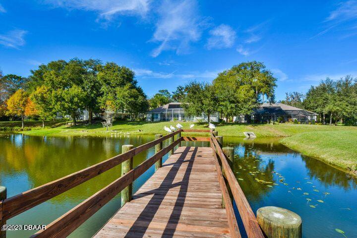 87 Timucuan Drive Ormond Beach, FL 32174 - Photo 59 of 63 a view of swimming pool with a yard