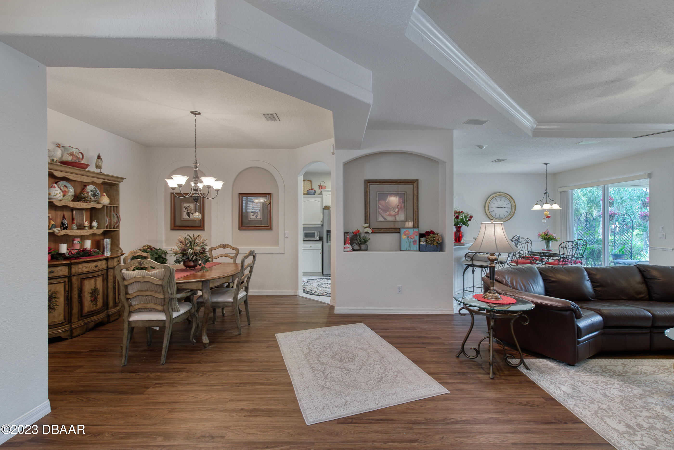 87 Timucuan Drive Ormond Beach, FL 32174 - Photo 10 of 63 a living room with furniture and wooden floor