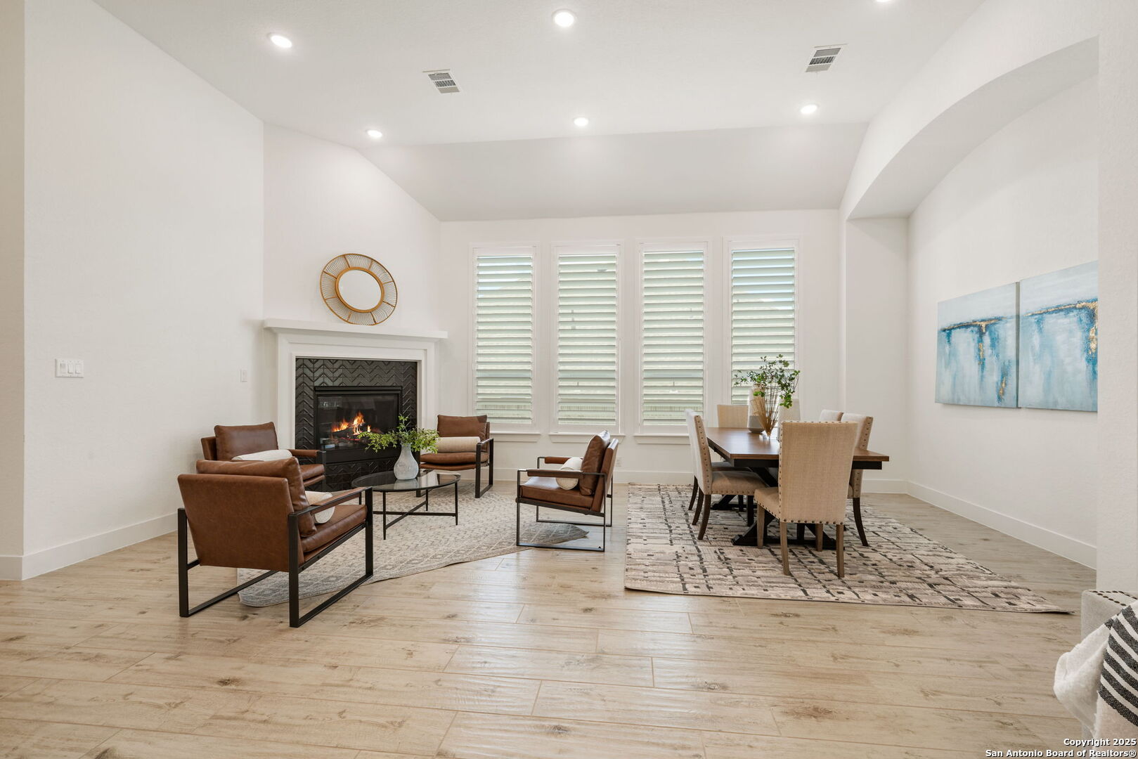220 Corazon Boerne, TX 78006 - Photo 14 of 50 a living room with furniture a fireplace and a large window