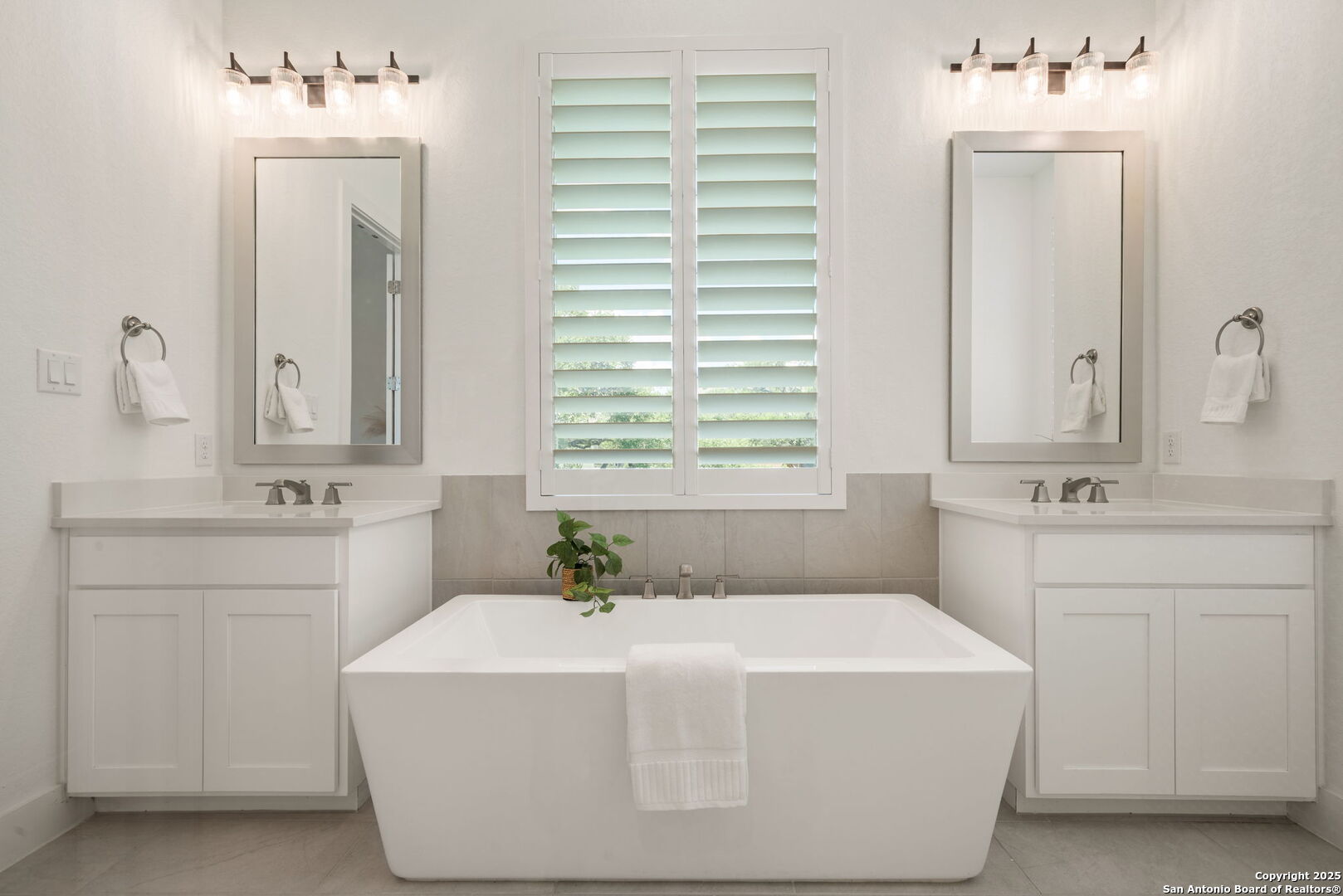 220 Corazon Boerne, TX 78006 - Photo 19 of 50 a bathroom with a sink mirror and a window