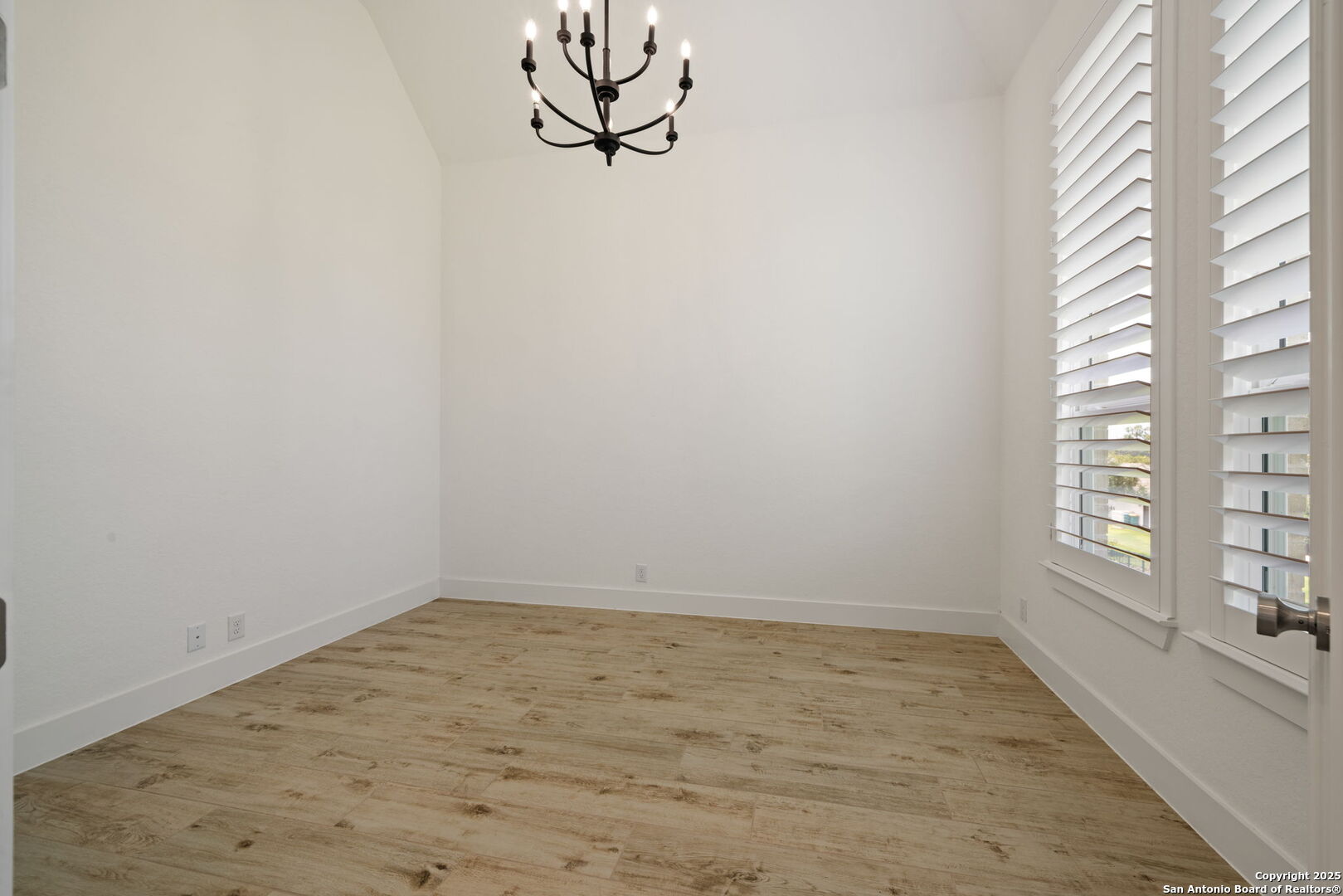 220 Corazon Boerne, TX 78006 - Photo 24 of 50 wooden floor in an empty room with a window