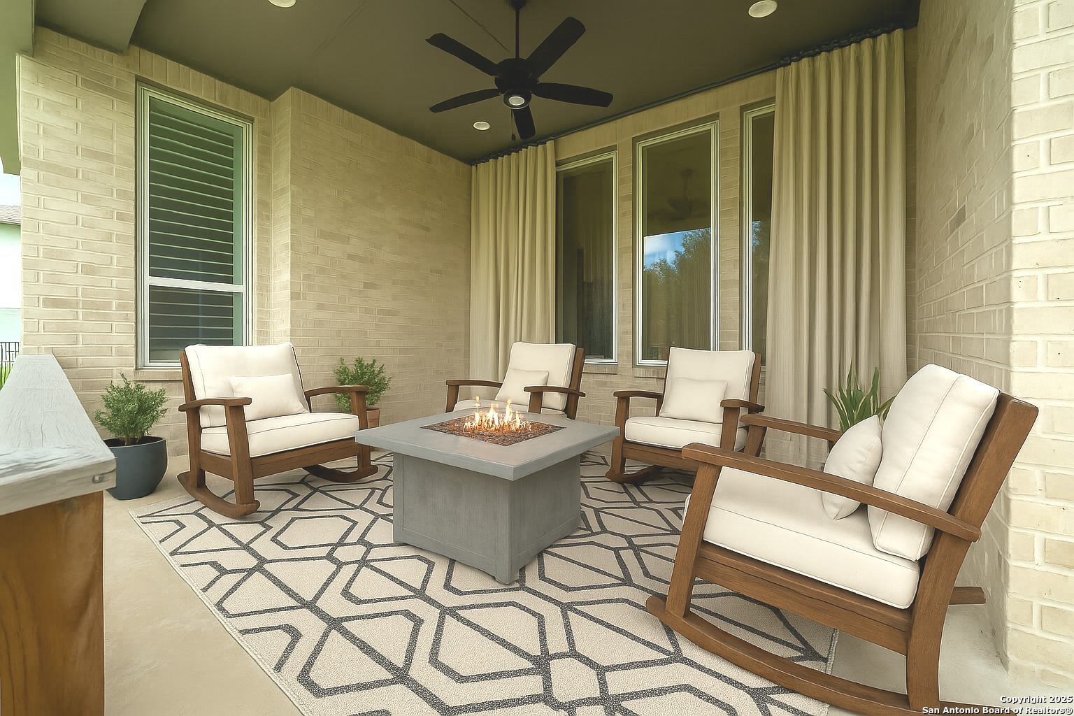 220 Corazon Boerne, TX 78006 - Photo 34 of 50 a living room with patio furniture and a large window