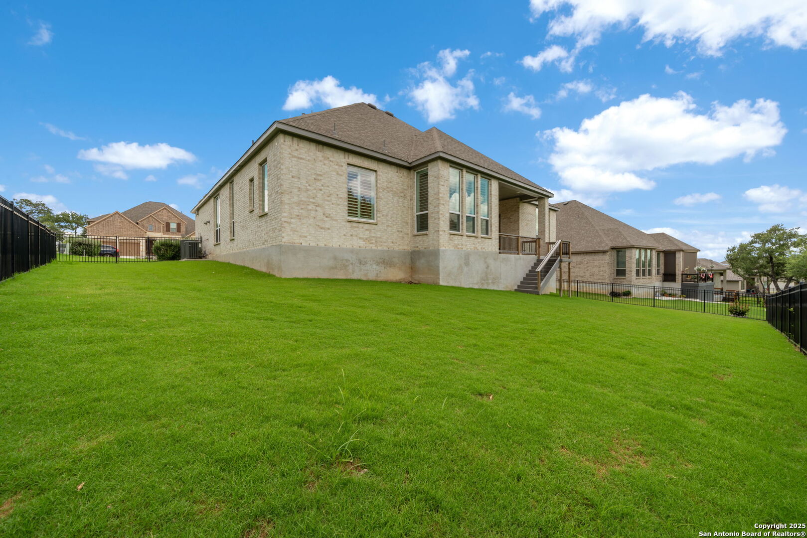 220 Corazon Boerne, TX 78006 - Photo 36 of 50 a front view of a house with garden