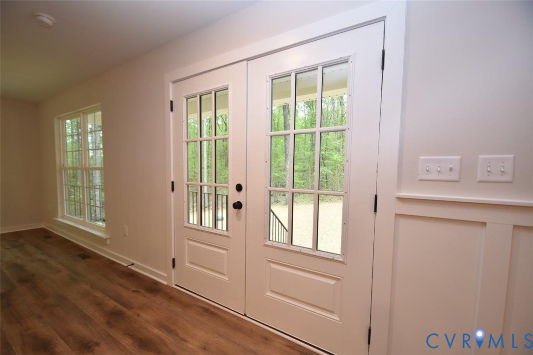 1749 Hollands Road Palmyra, VA 22963 - Photo 20 of 40 Doorway to outside with french doors and wood fini