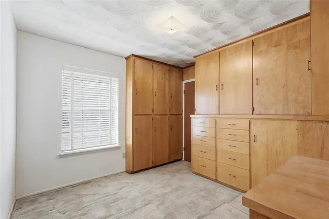 a view of backyard and garage